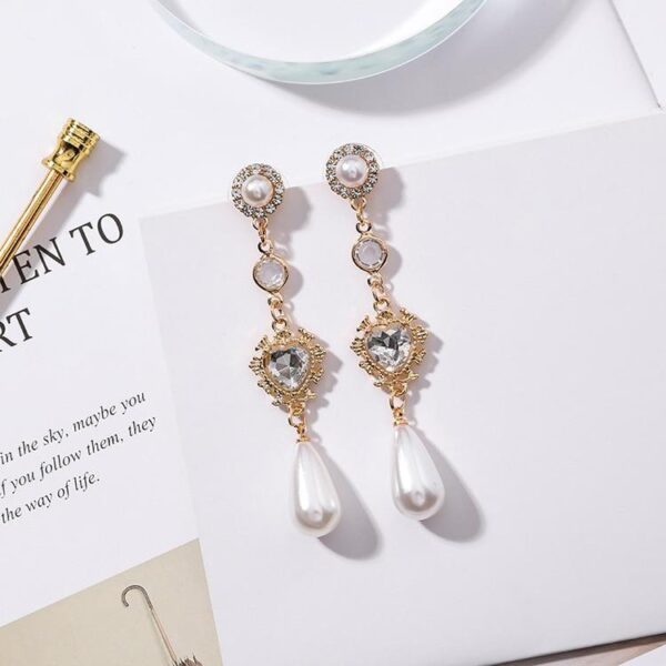 Gold Pearl Drop Earrings - Image 4